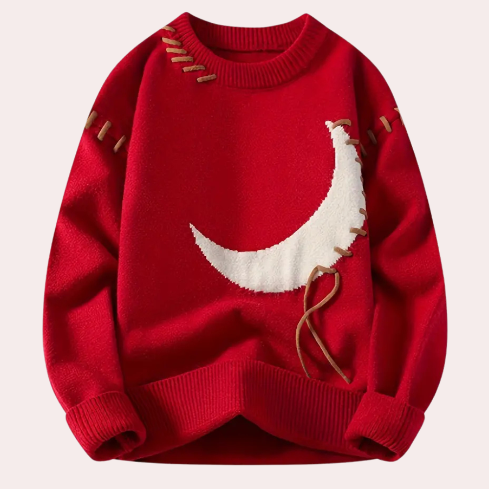 Rød genser med hvit halvmåne-design og brune snøredetaljer. Perfekt for høst- og vintermote. Komfortabel og stilig strikkegenser.