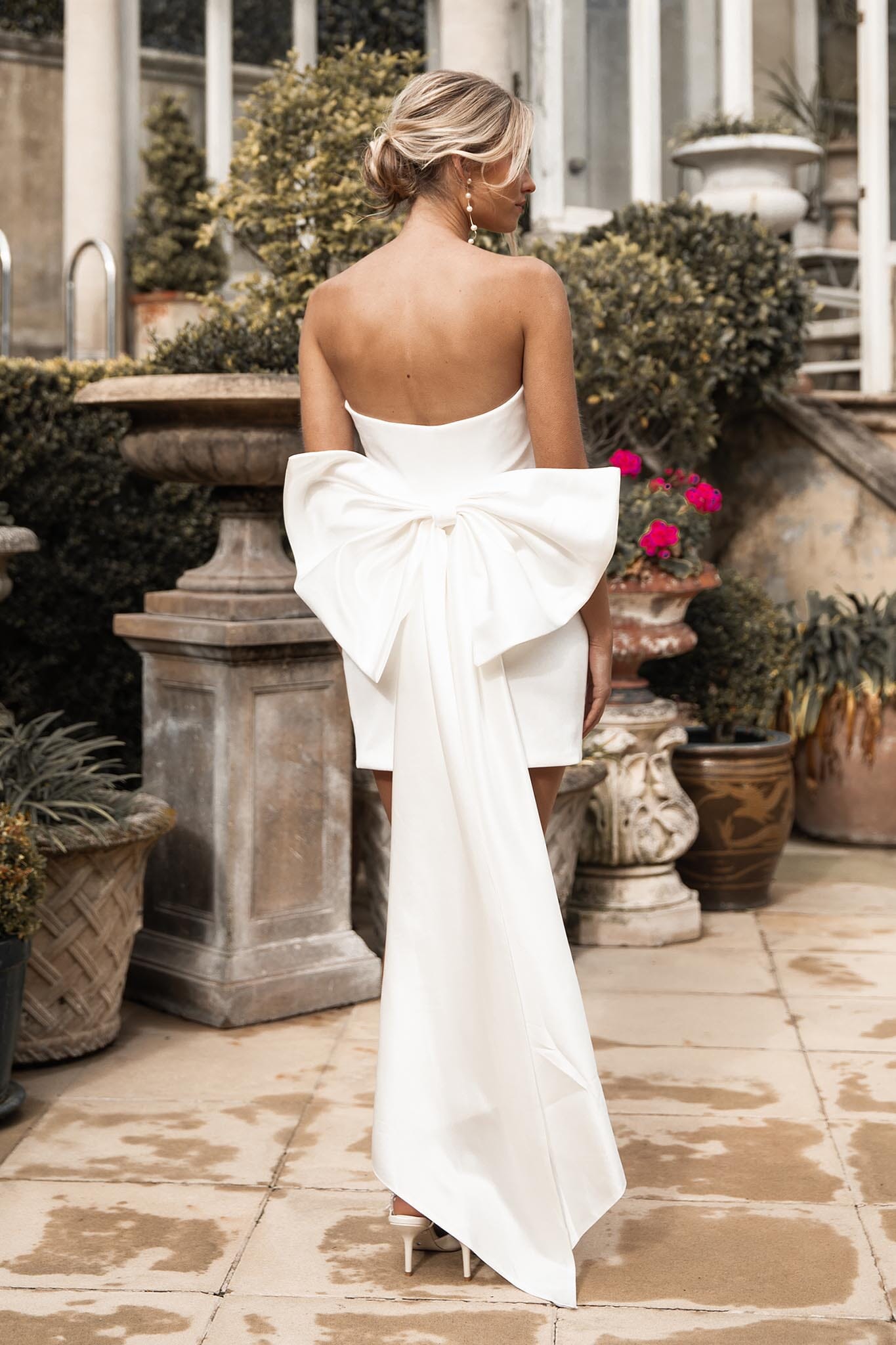 Ivory White Strapless Mini Dress with Oversized Bow Detail at the back