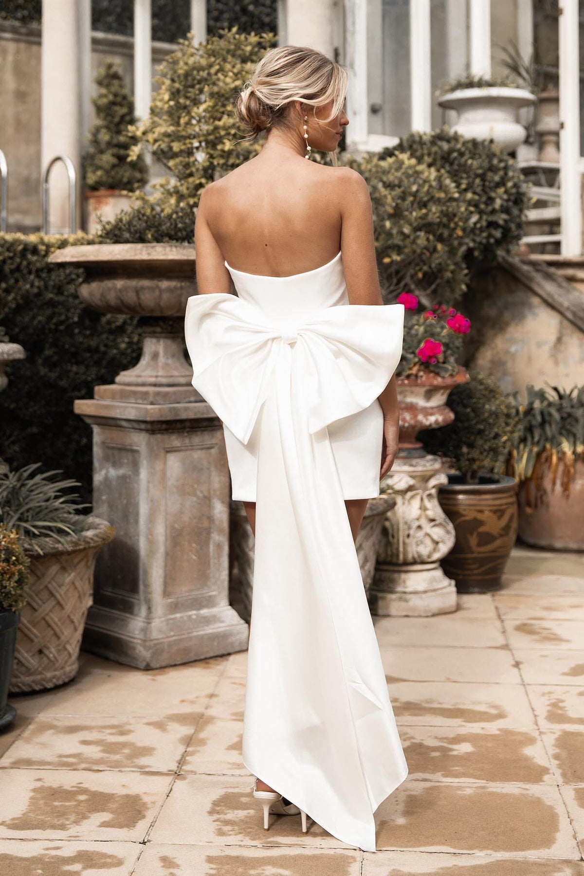Ivory White Strapless Mini Dress with Oversized Bow Detail at the back