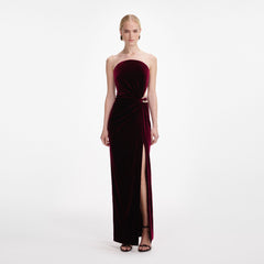 Front view of a woman wearing the Burgundy Velvet Bandeau Maxi Dress