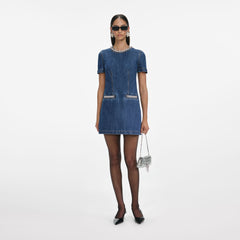 Front view of a woman wearing the Denim Crystal Trim Mini Dress