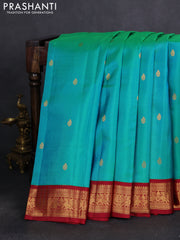 Pure kanchipuram silk saree dual shade of teal green and maroon with zari woven buttas and annam zari woven korvai border