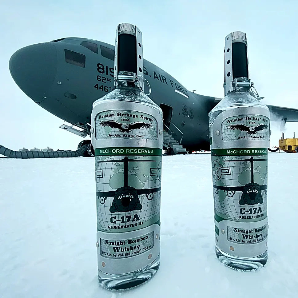 Boeing C-17A Globemaster III decanters honoring McChord Reserves with USAF C-17 aircraft on icy terrain. 