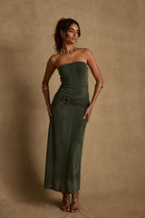 Emerald maxi dress with elegant accents, a vacation maxi dress essential.
