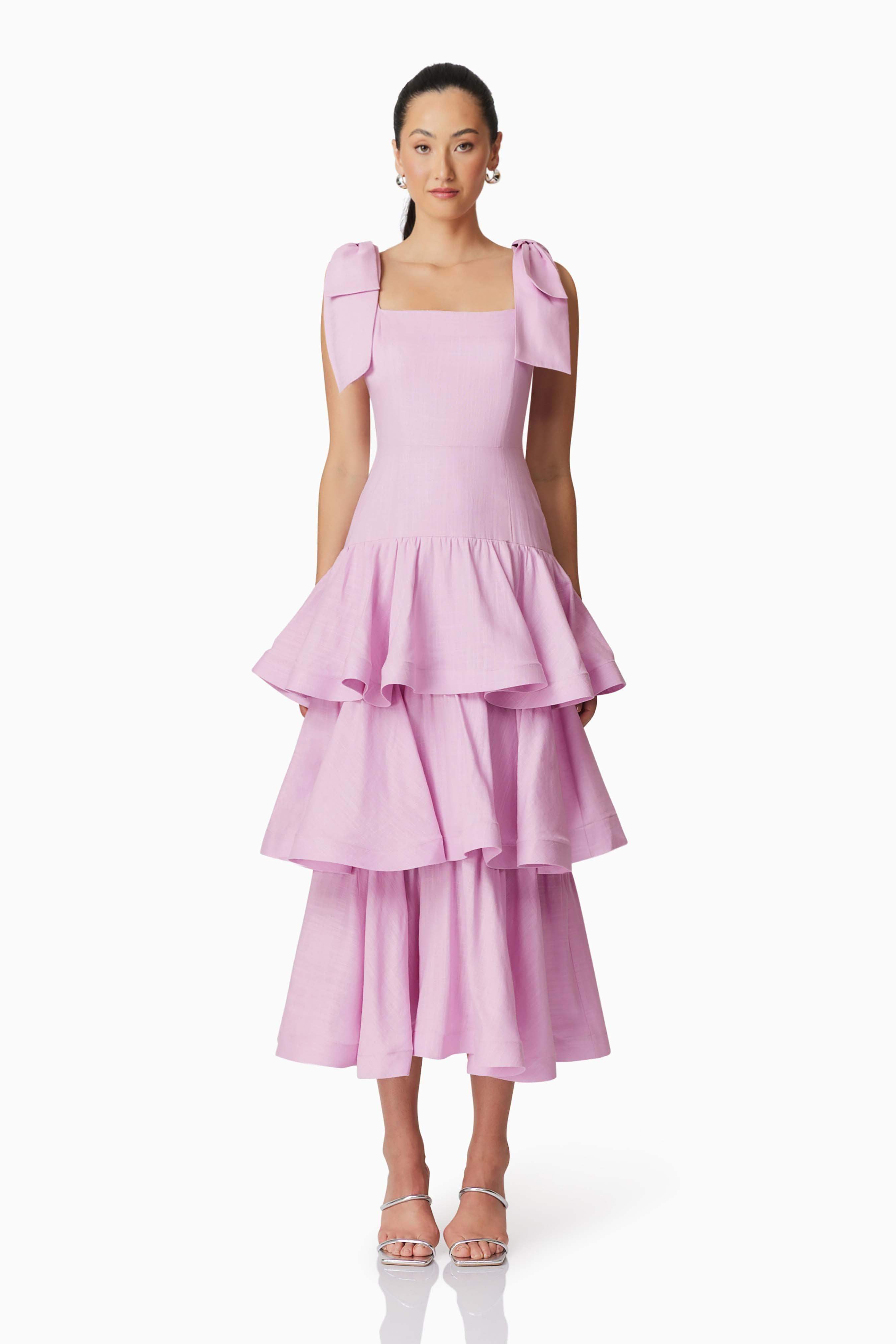 Brunette model wearing Kara Tiered Maxi Dress in Purple front shot