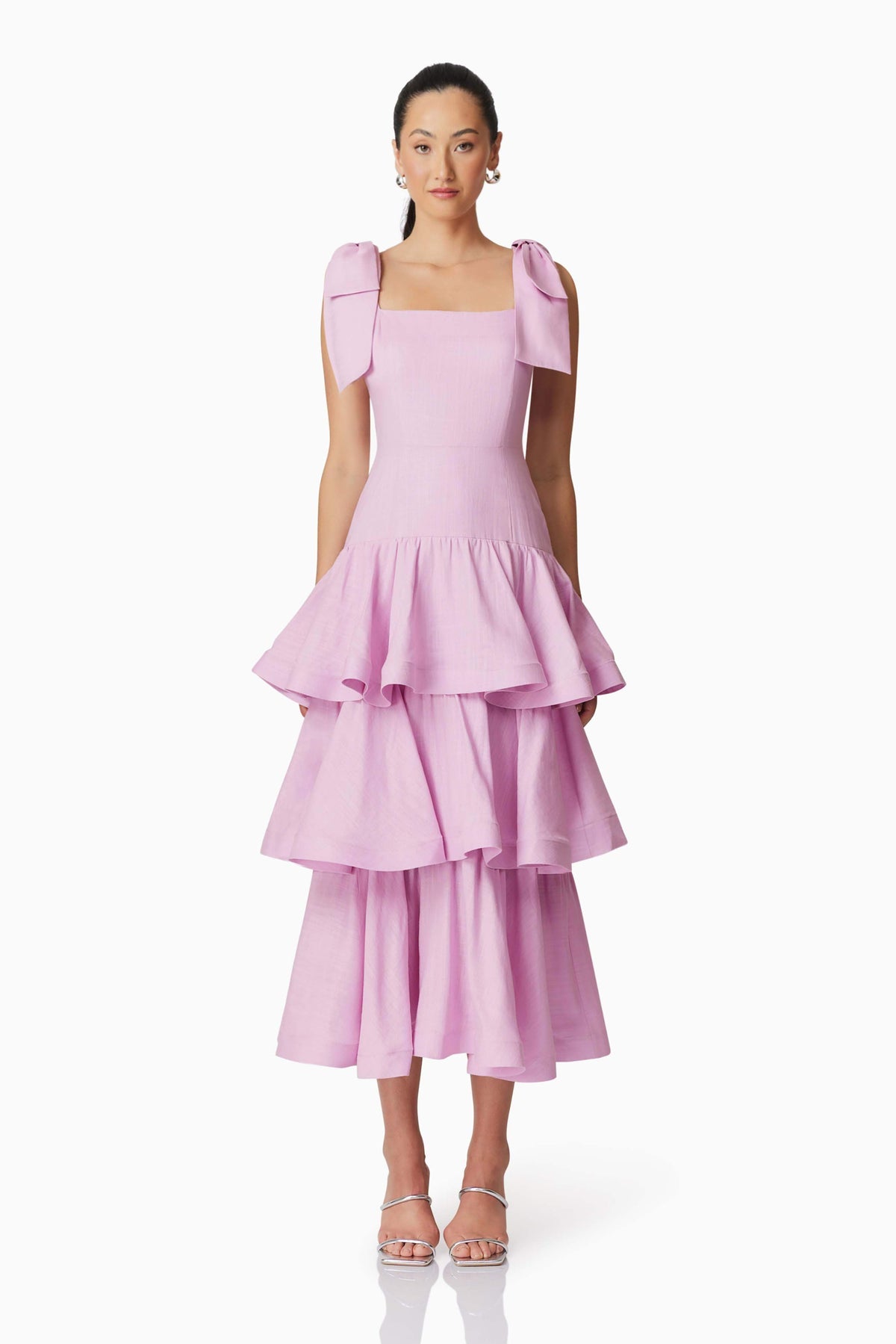 Brunette model wearing Kara Tiered Maxi Dress in Purple front shot