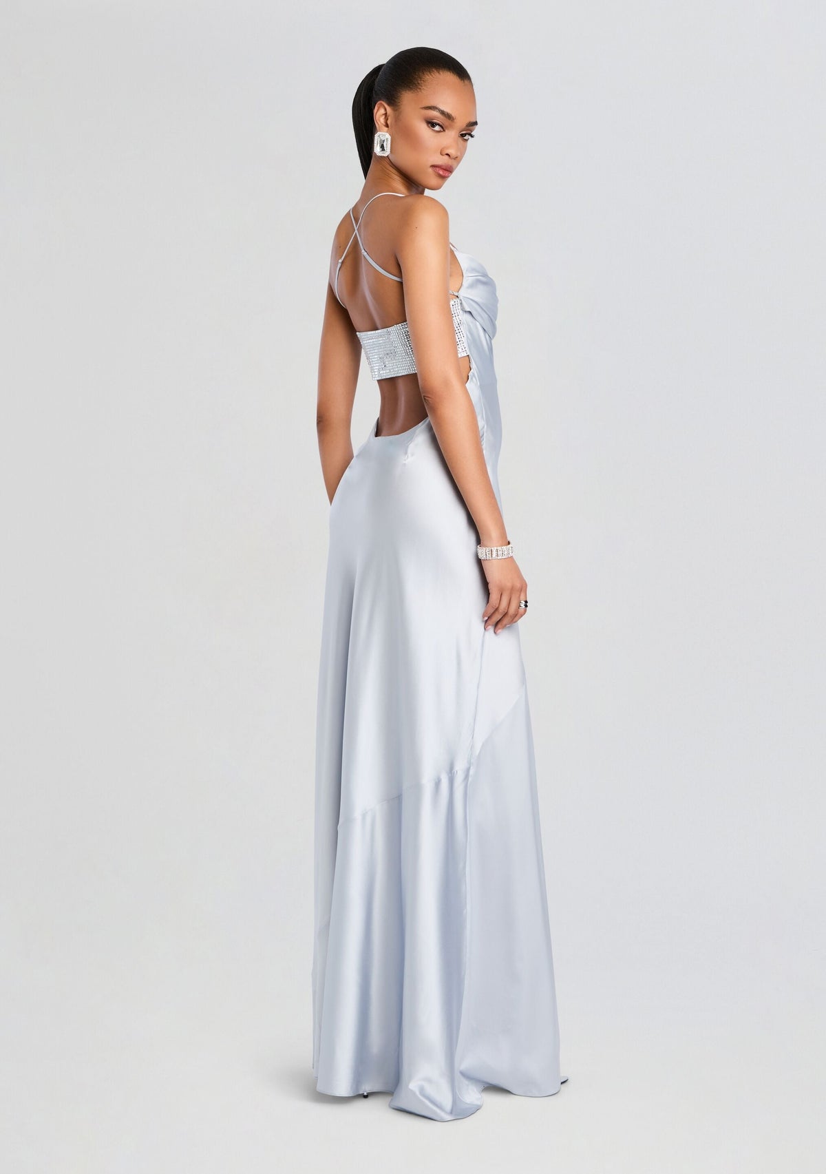 Back view of a silver blue Emery Embellished Silk Dress with crystal bandeau top and crisscross straps