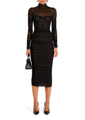Black mesh ruched midi dress on a model with sheer long sleeves and fitted silhouette