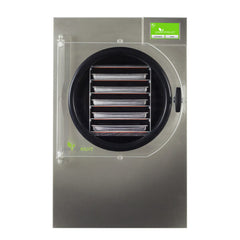 The Harvest Right Home Pro Freeze Dryer Stainless Steel - Medium features a stainless steel body, clear front door showing horizontal shelves, an industrial vacuum pump, and a green label at the top right for efficient home food preservation.