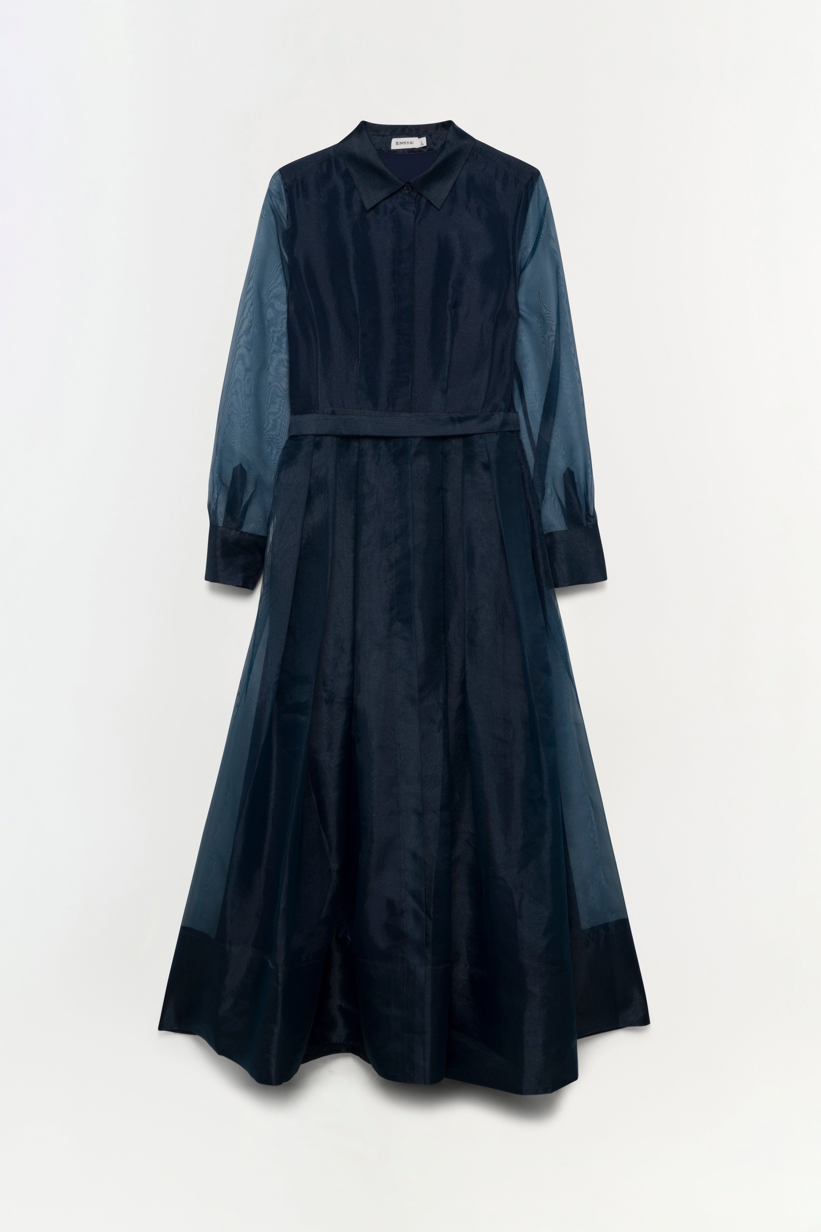 Navy dress with collared neckline, long sleeves, belted waist, and full skirt in color-block design.