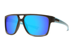 The Liive Elvis Mirror Polar Sunglasses boast a sleek black frame with mirror blue lenses, a double bridge design, and black-to-light-blue arms featuring a subtle logo. They provide essential UV protection for your eyes.