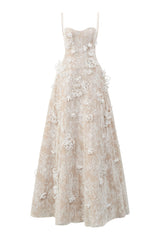 L'SCARLETT white A-line spaghetti strap lace maxi dress with gitter lace details, perfect for elegant summer occasions.
