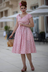 Lady wearing a Lily Light Pink & White Polka Dot Off Shoulder Dress