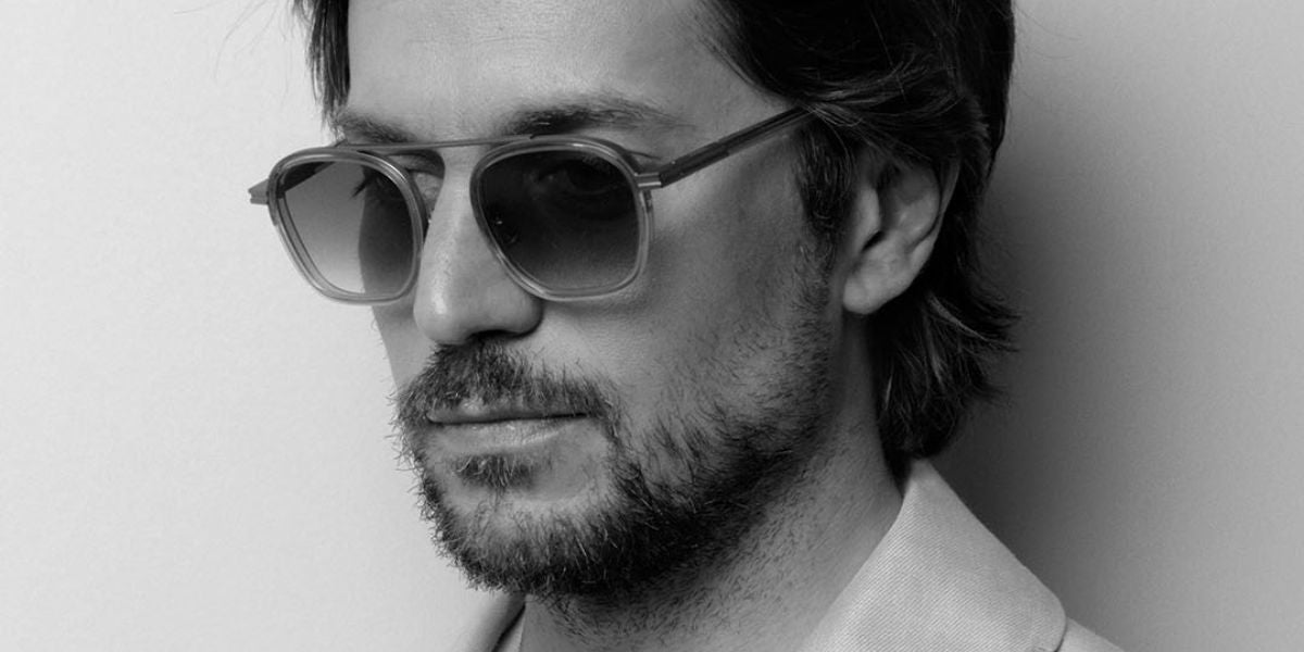 Lucas Bravo is seen wearing Zegna Orizzonte I EZ0231 20B sunglasses in grey crystal to attend "The Balconettes" photocall during the 2024 Cannes Film Festival