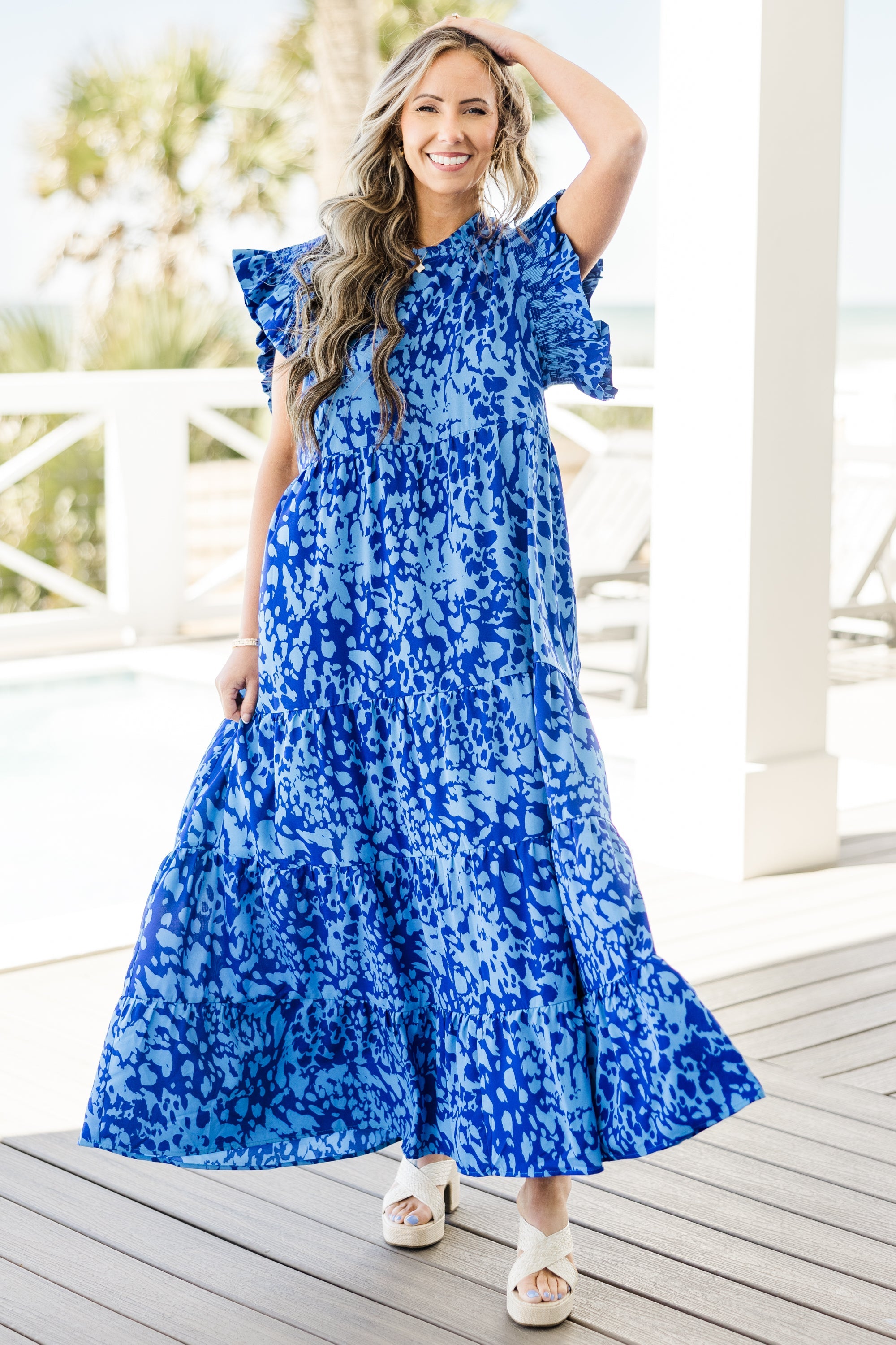 Chic Soul plus size clothing, short-flutter-sleeve ruffled blue baby doll maxi dress with a high-neckline and a darker blue abstract leopard print spotted pattern