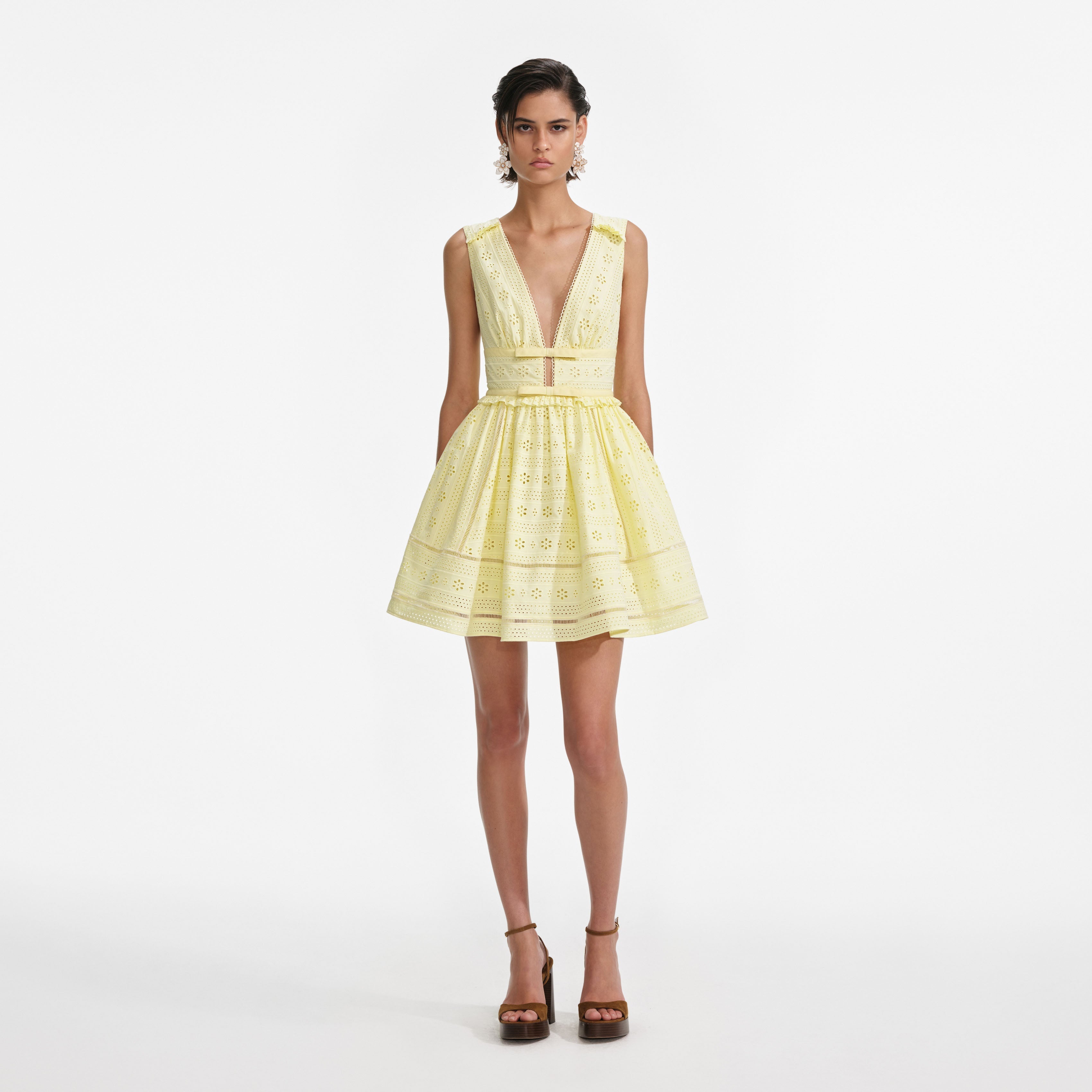Front view of a woman wearing the Yellow Cotton Broderie Mini Dress [hover]