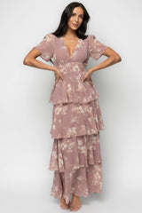 Full-length side profile of Mauve Floral Montaigne Maxi showing cascading asymmetrical ruffles and soft chiffon movement on model.