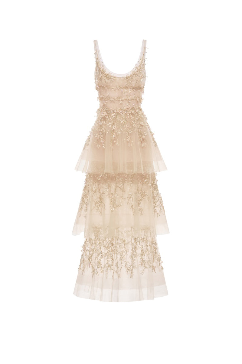 Light pastel tiered midi dress by Montsand featuring flowy fabric and layered design, perfect for spring and summer wear.