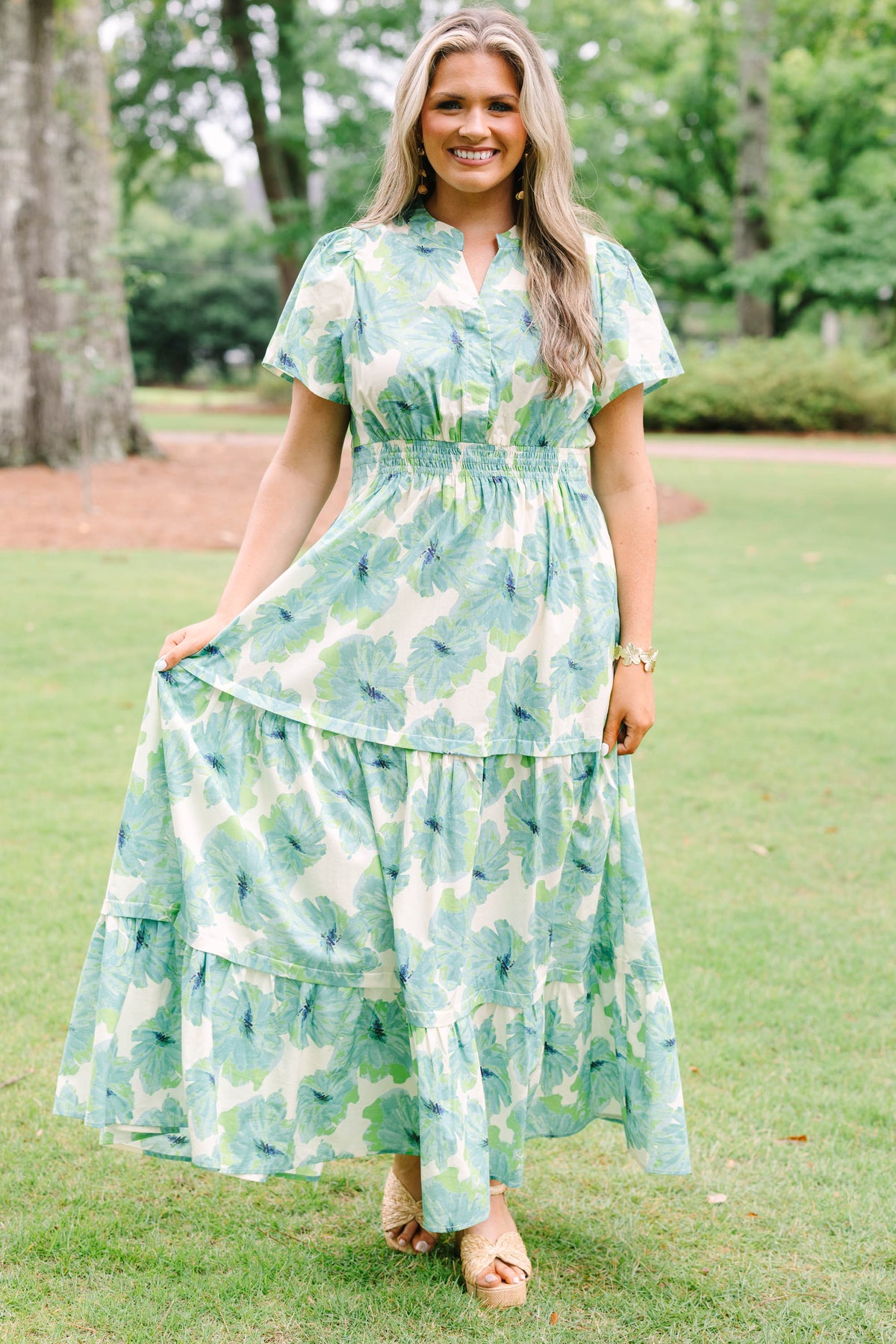 Chic Soul plus size clothing, short-sleeve green maxi dress with a smocked waistline and a watercolor floral print with a tiered skirt and a v-neckline