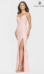 A woman models the Faviana S10812 Light Pink Lace Long Prom Dress, featuring beaded lace tulle, spaghetti straps, and a thigh-high slit, standing against a plain background with the Faviana logo in the upper right corner.