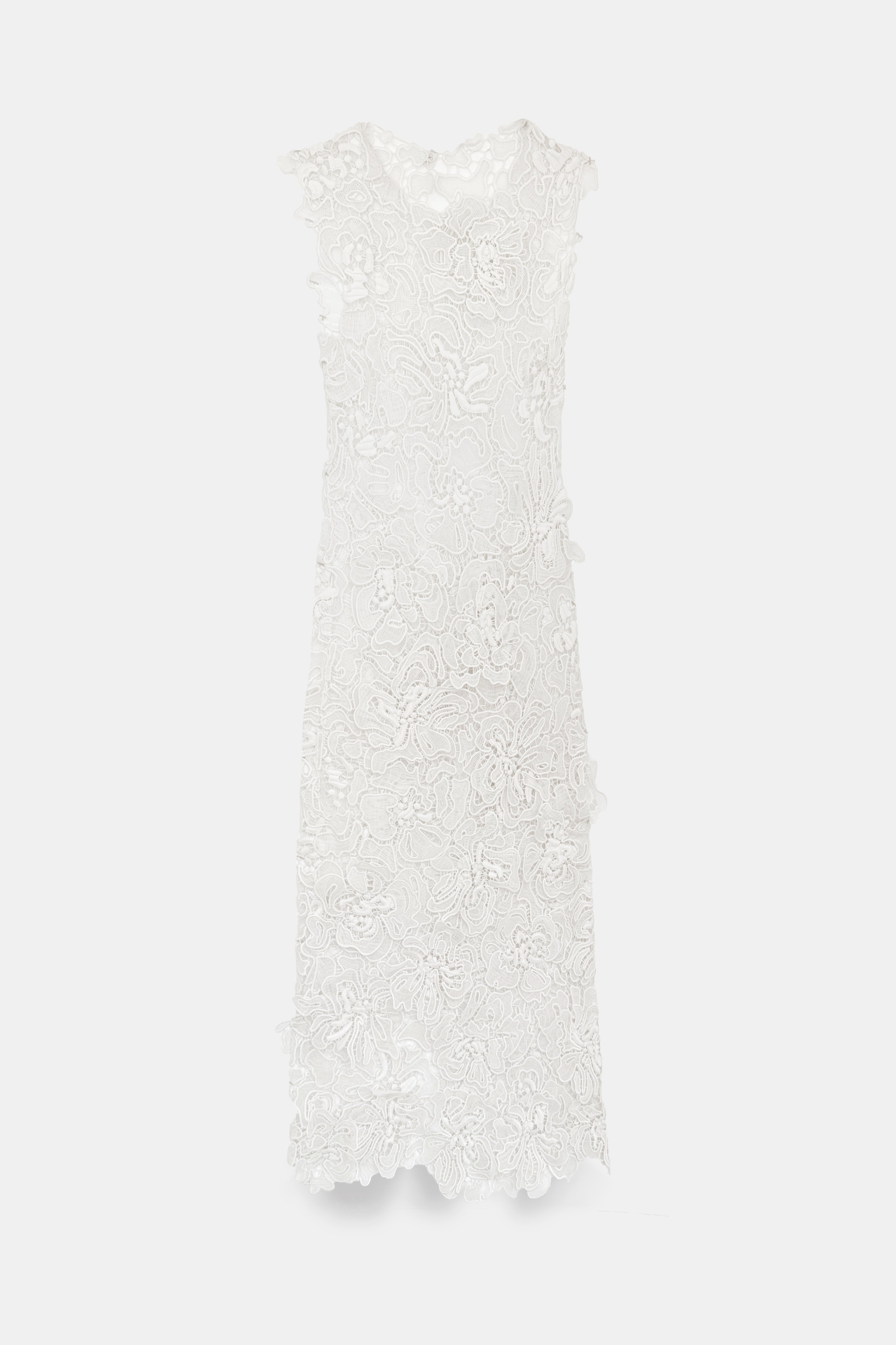White lace midi dress with intricate floral pattern, sleeveless design, and scalloped hem.