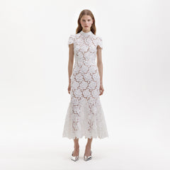 Front view of a woman wearing the White Flower Lace Midi Dress