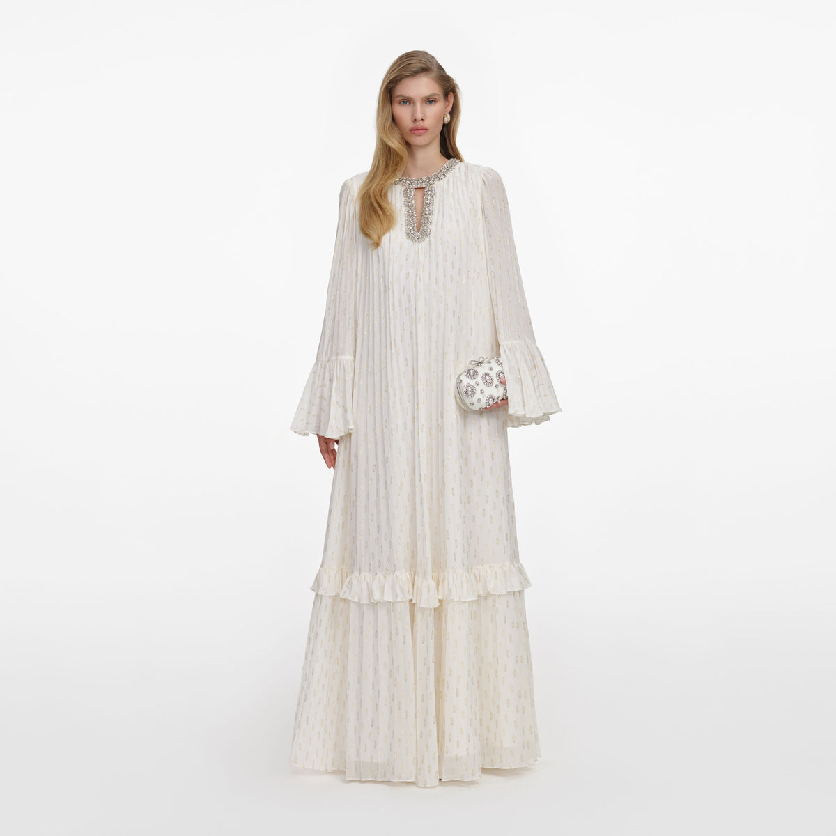 Front view of a woman wearing the Cream And Gold Chiffon Maxi Dress