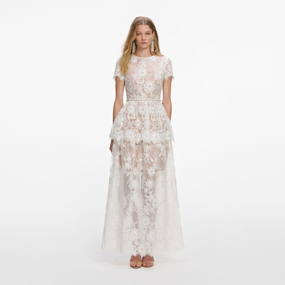 Front view of a woman wearing the White Sequin Lace Tiered Maxi Dress