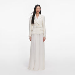 Front view of a woman wearing the Cream Tailored Boucle Chiffon Maxi Dress