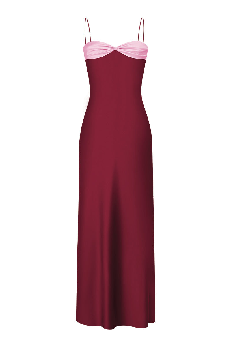 Stolen Stores Swan Slip Maxi Dress in burgundy and pink, front view showcasing flowy fabric and stylish design.
