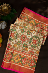 Varamahalakshmi Cream & Pink Patola Ikat Saree