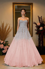Pink strapless gown with crystal and pearl bead embroidery.