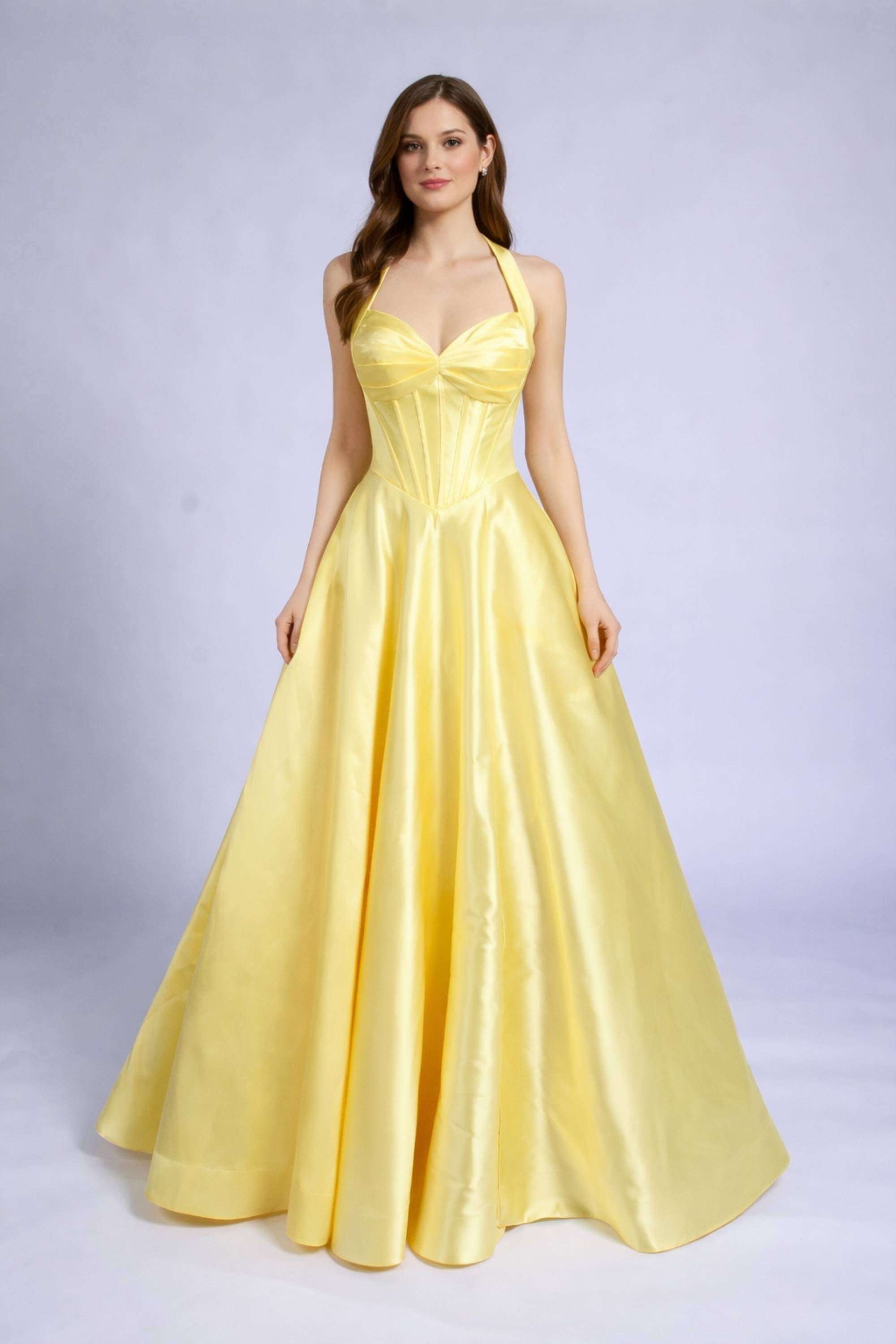 Jessica Stuart Bonnie Yellow Mikado Prom Ballgown with halter neck and corset bodice, featuring a full-length flared skirt for prom elegance.