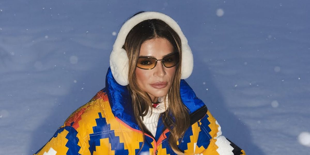 Thassia Naves was seen wearing gold Miu Miu MU A50S 5AK7R1 sunglasses with yellow lenses during her ski trip in Courchevel, France in January 2025