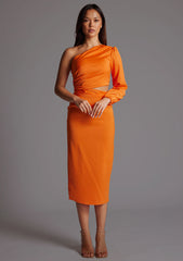 Front image of a model wearing an orange mid dress with a asymmetric, one long sleeve design and subtle side cut-out.  The design featured is the Vesper Niccola Orange Midi Dress