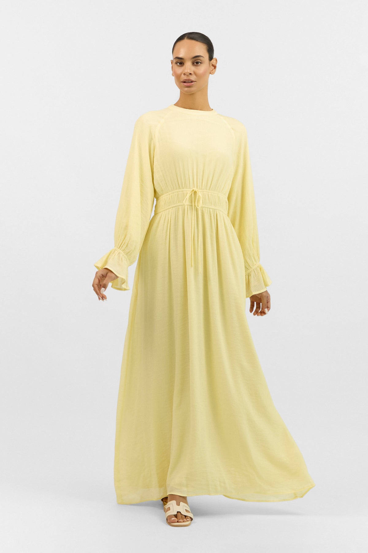Front view of the FARES Bow Elastic Waist Dress in Butter Yellow, a soft and elegant bow dress perfect for everyday wear.