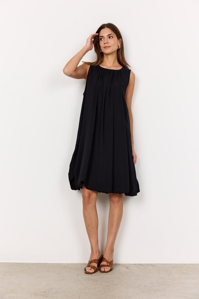 Model wearing a black Soyaconcept SC-SIDRA 2 Kjole Viskose dress with a gathered neckline and loose silhouette.