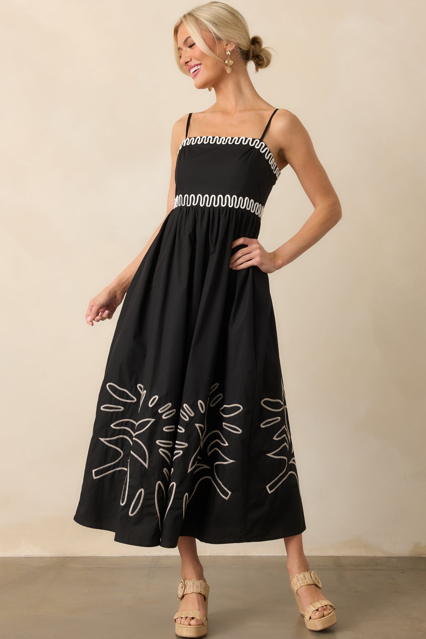 Full body image highlighting the white contrast squiggle trim across the bodice and the structured shape of the fully lined skirt.