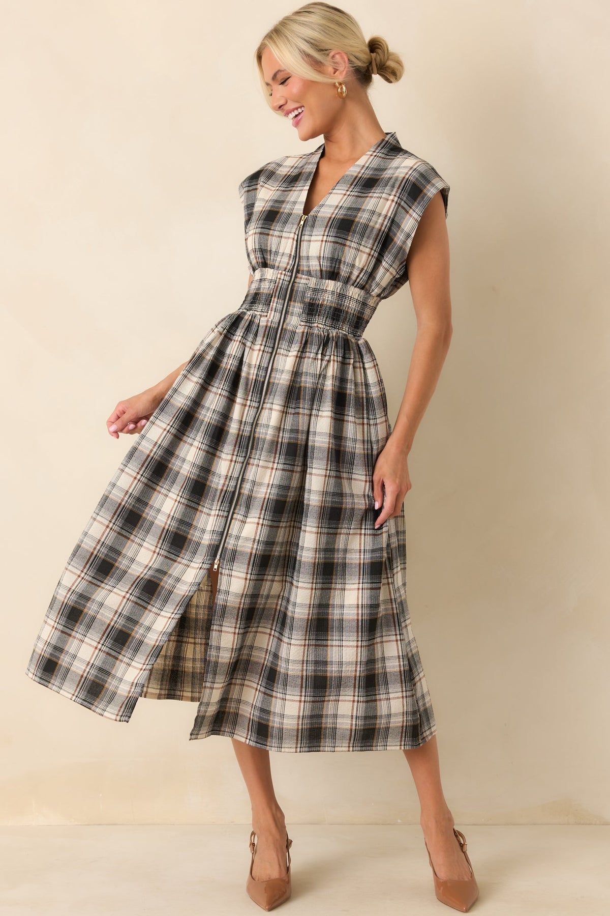 Tartan plaid dress displayed in a front-facing full body shot, highlighting the capped sleeves and front slit.