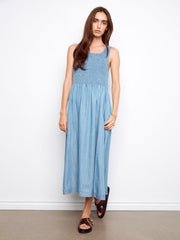 Blue Tencel maxi dress with a scoop neckline, featuring convenient side pockets for added style by Charlie B.