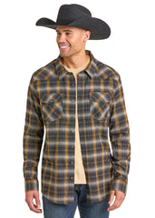 Man wearing a black cowboy hat and plaid shirt on a white background