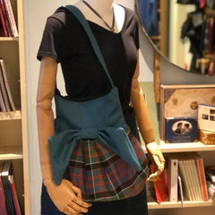 Inside view of the MacPherson Modern Effie Bag featuring a cotton quilted lining and two internal pockets for organization.