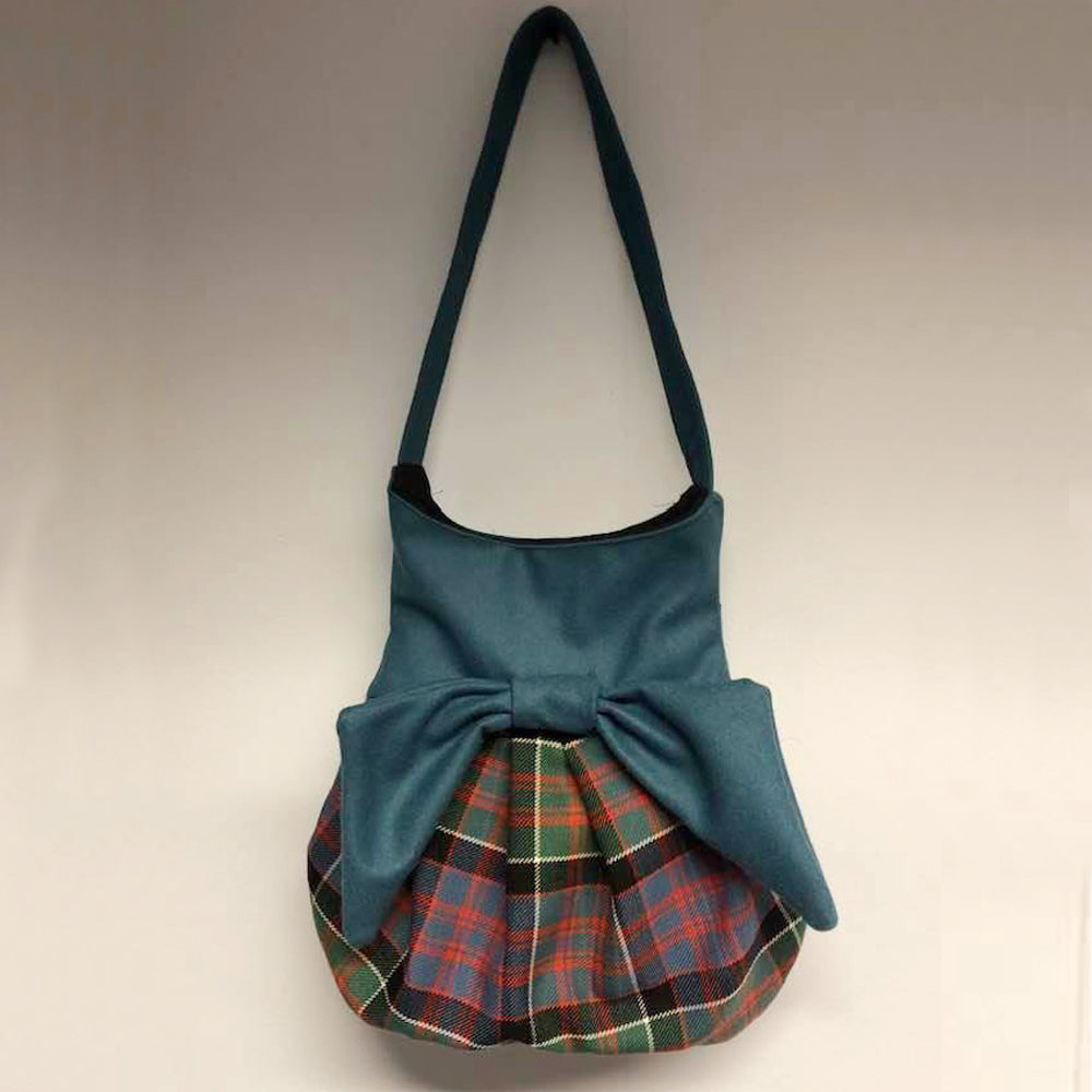MacPherson Modern Effie Bag featuring customizable Aqua top and bow, handcrafted from 100% wool Melton, showcasing style and luxury.