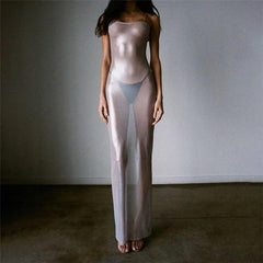 Sheer mesh maxi dress with spaghetti straps, elegant evening wear.