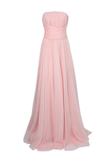 Pink powder corset draped gown by Joanna Andraos, featuring elegant flowing fabric and structured corset design.