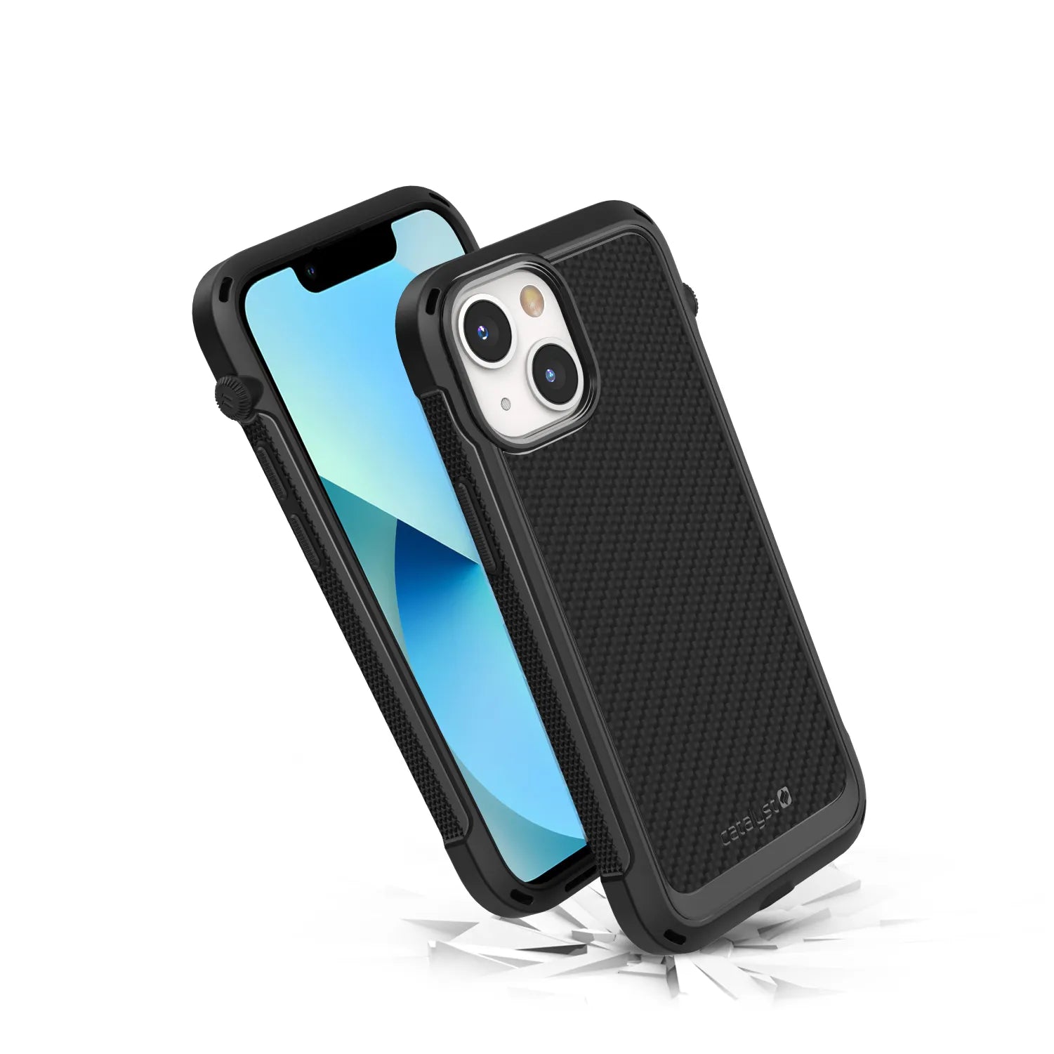 The Catalyst Case US Vibe Case for iPhone 13 mini, shown partly off the phone and standing upright, features a rugged black design with a textured back. Its MIL-STD 810G drop protection is suggested by the cracked white surface below. MagSafe compatible.