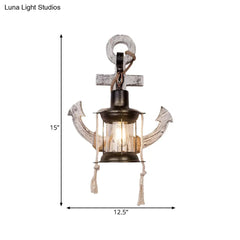 Industrial Style Wall Mount Oil Lamp With Clear Glass Shade And Black Metal Frame