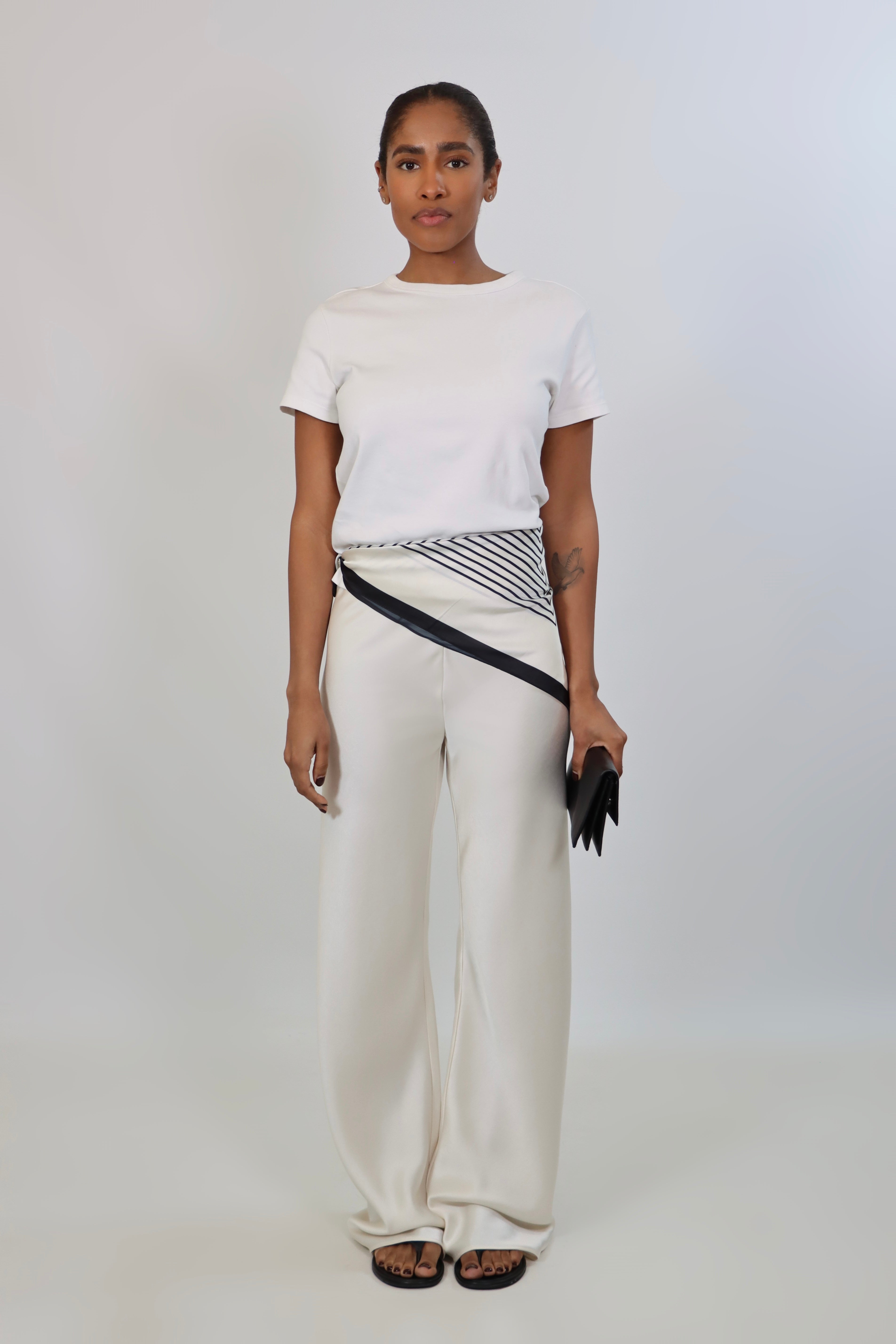 Ivory satin pants with soft drape and elastic waistband, styled with the April Seven scarf.