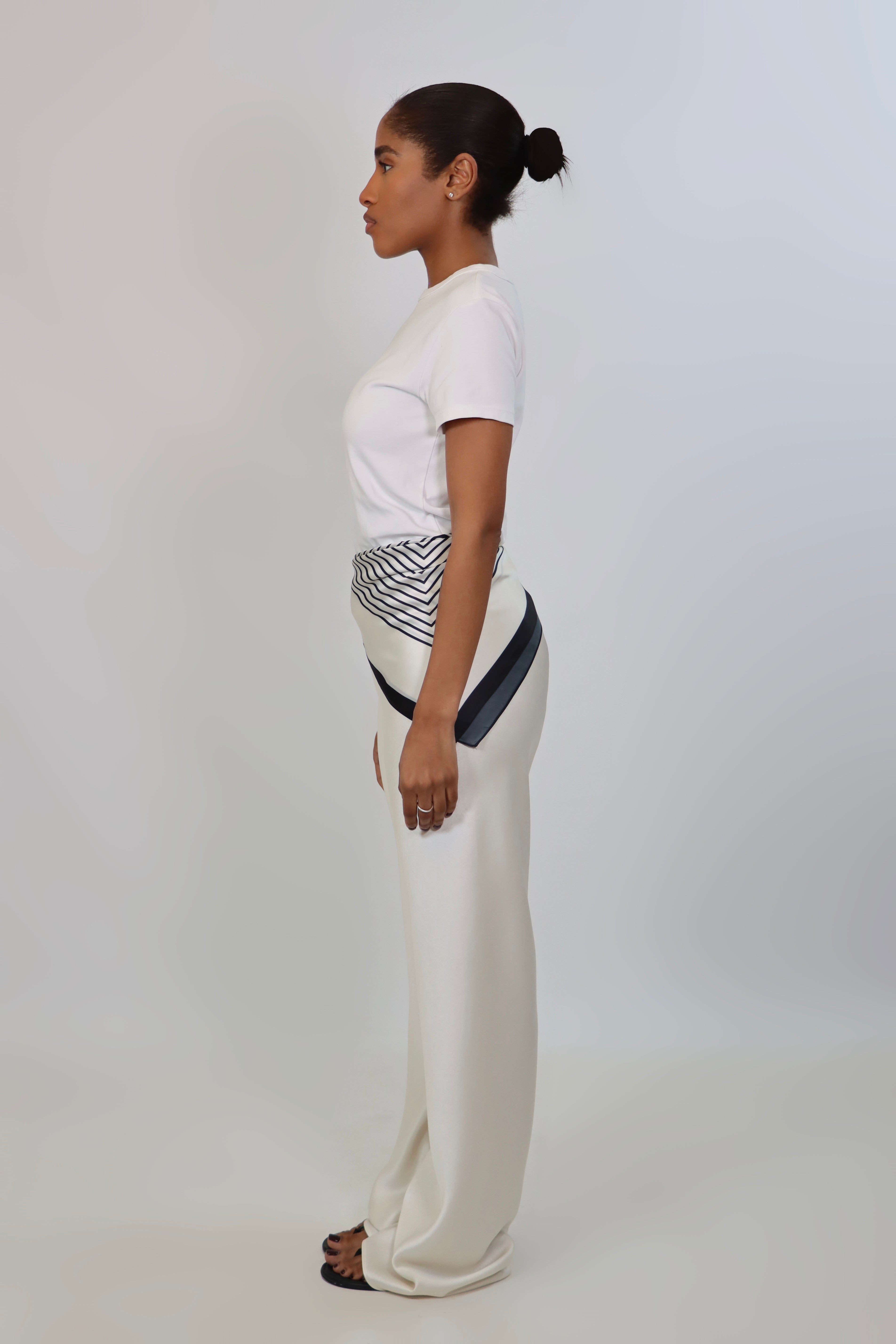 Ivory satin pants with soft drape and elastic waistband, styled with the April Seven scarf.