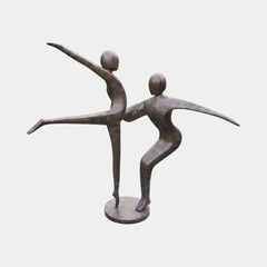 Large Contemporary Dancing Figures Bronze Sculpture by Giant Sculptures, two elongated abstract figures mid-movement on a round base, shown against a plain background.